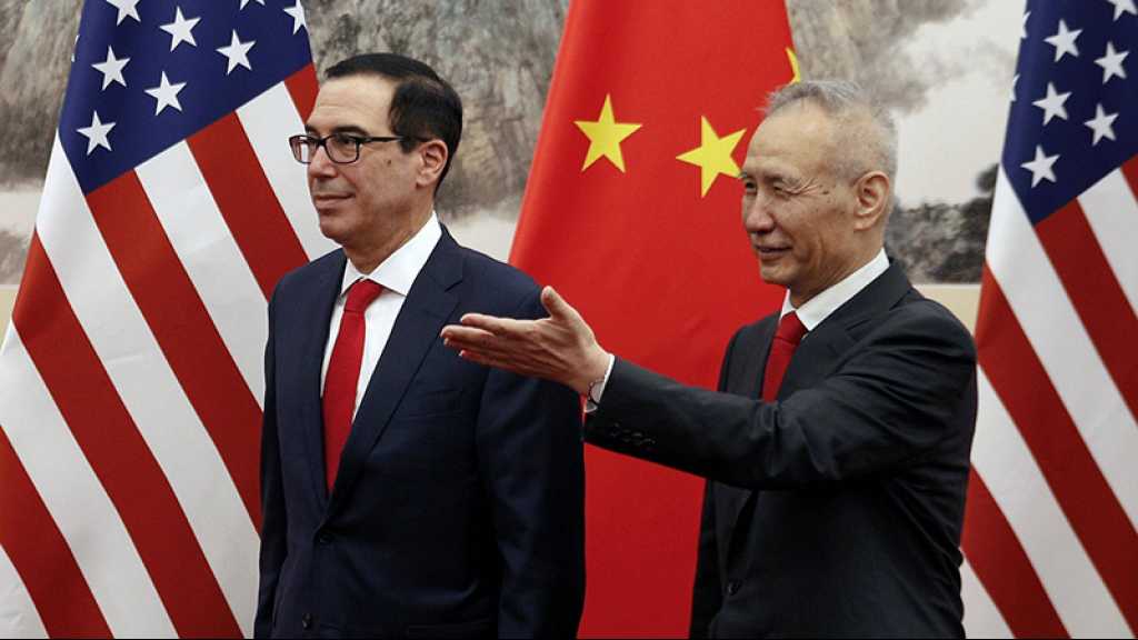 Commerce: les sanctions américaines entrent en vigueur, Pékin va répliquer
