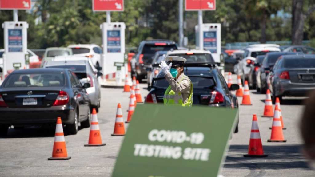 Coronavirus: record de cas aux Etats-Unis, des dizaines de millions d’Indiens reconfinés