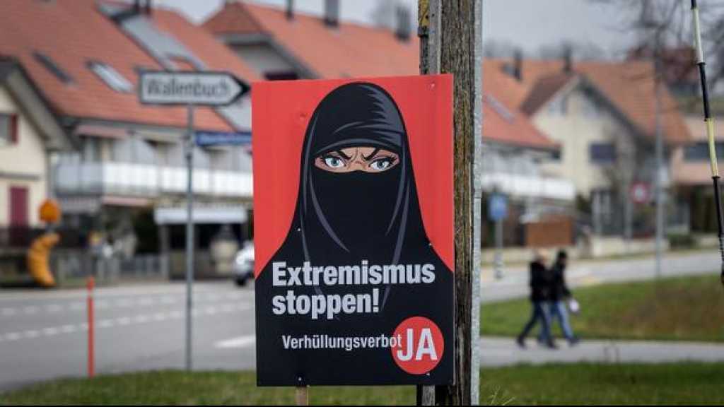La Suisse adopte l’initiative anti- burqa d’une courte majorité