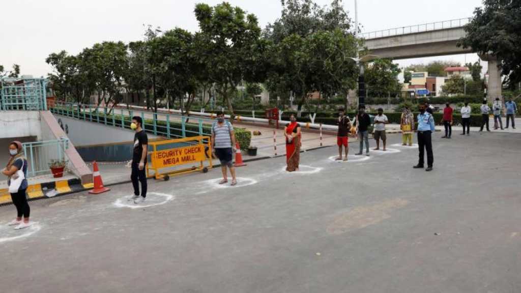 Coronavirus: vaccins pour tous aux Etats-Unis, confinement à New Delhi