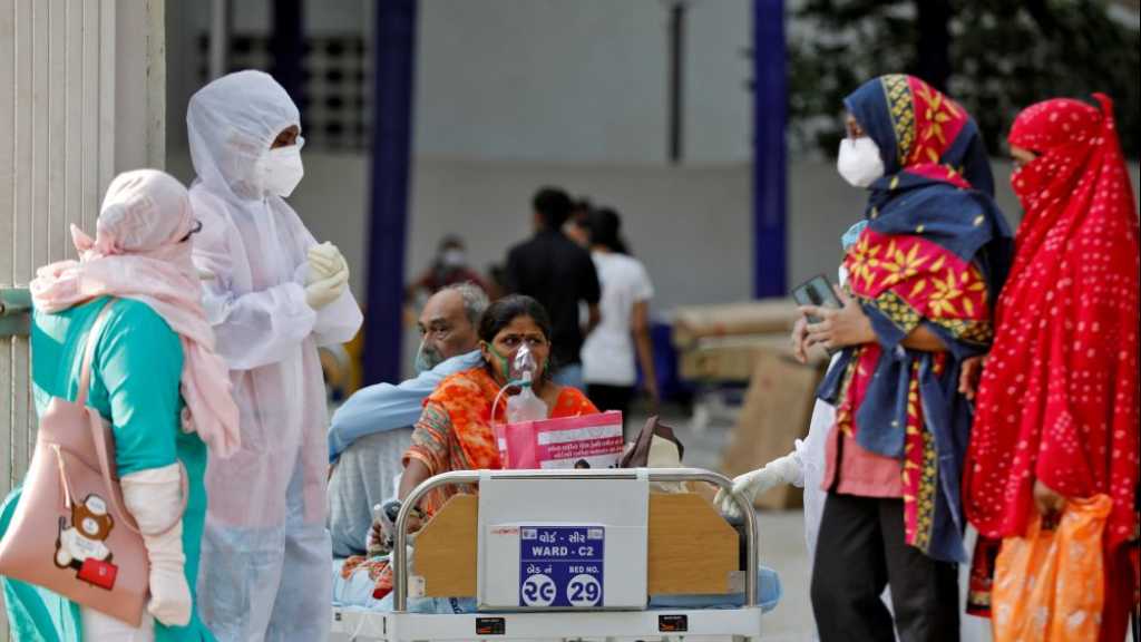 Coronavirus: nouveau record mondial de cas en Inde, un milliard de doses administrées
