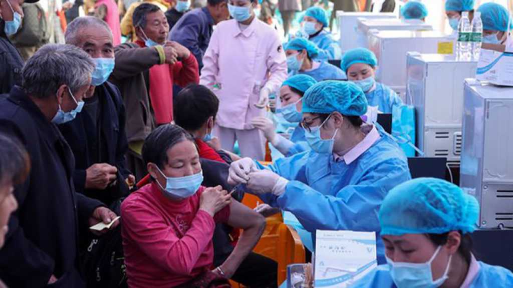 Covid-19: un milliard de doses de vaccins administrées en Chine, assouplissements en France et au Japon