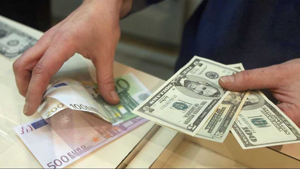 L’euro frôle le passage sous un dollar, au plus bas depuis 2002